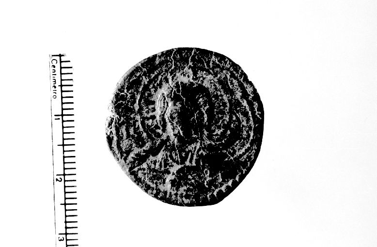 moneta - follaro (sec. XI d.C)