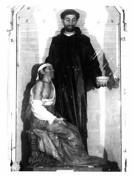 San Giovanni di Dio cura gli appestati (gruppo scultoreo) - produzione Italia meridionale (sec. XX)