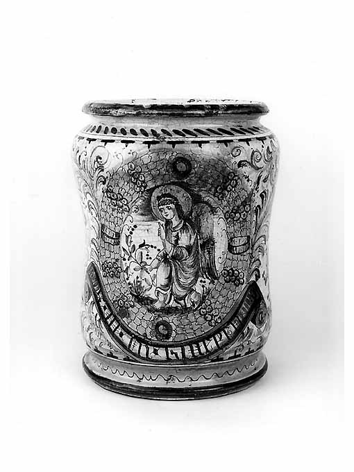 angelo genuflesso nell'atto di cogliere un fiore (vaso da farmacia) - manifattura Italia meridionale (prima metà sec. XVII)