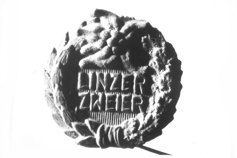 serto di alloro, quercia e stella alpina (distintivo) - ambito tedesco (prima metà sec. XX)