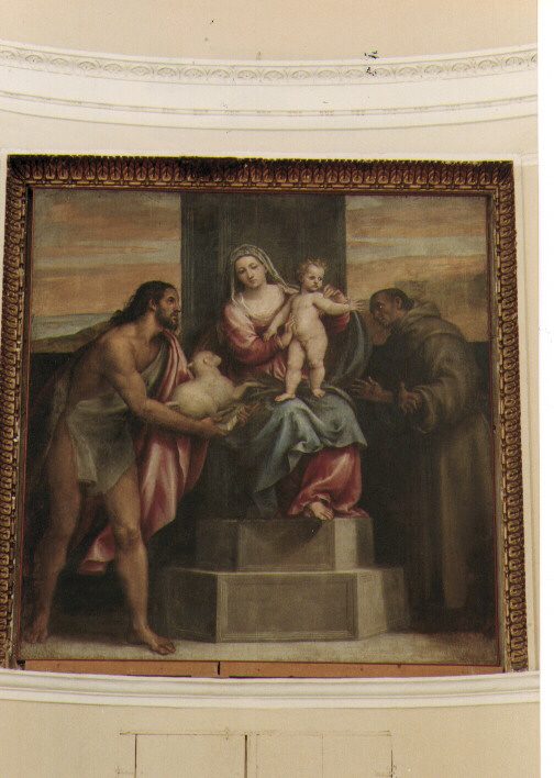 Madonna con Bambino in trono con San Giovanni Battista e San Francesco d' Assisi (dipinto) di De Sacchis Giovanni Antonio detto Pordenone (sec. XVI)