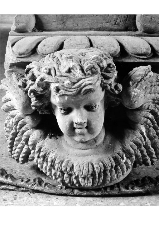 testa di angelo (cornicione, frammento) - ambito salentino (inizio sec. XIX)