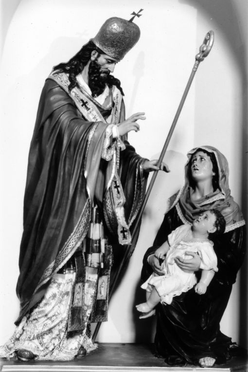 San Biagio guarisce un fanciullo (gruppo scultoreo) di Caretta Raffaele (primo quarto sec. XX)