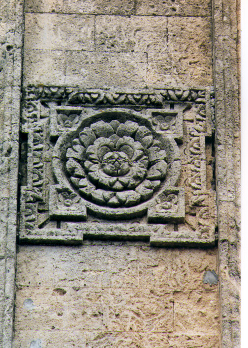 motivo decorativo a rosette (rilievo) - ambito salentino (sec. XVII)