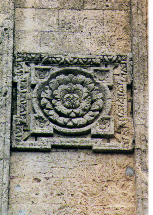 motivo decorativo a rosette (rilievo) - ambito salentino (sec. XVII)