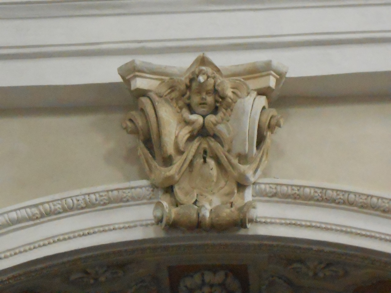 Capitello con testa d'angelo e festoni (mensola architettonica, coppia) - bottega mantovana (sec. XVII)