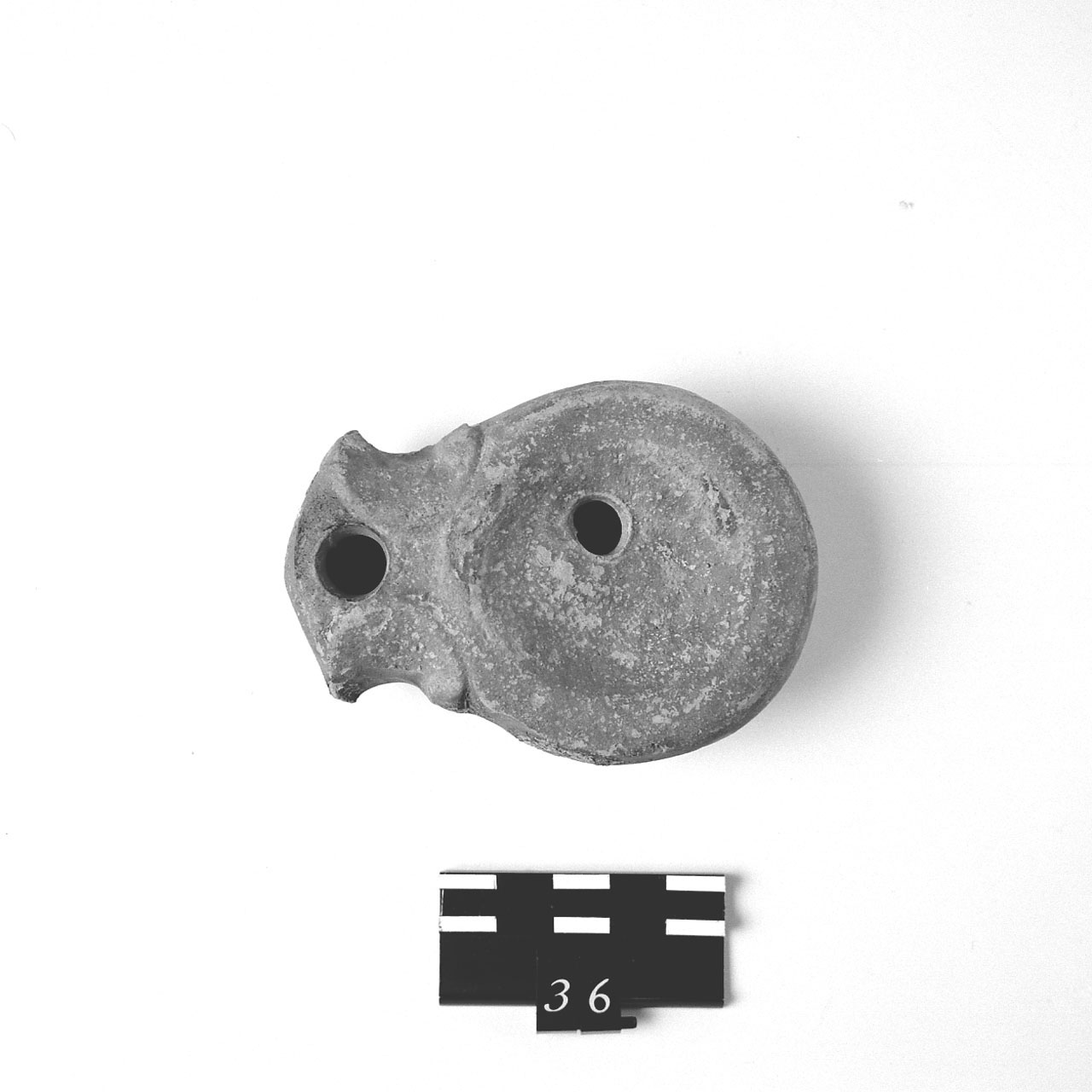 Lucerna a volute, Loeschcke I c (Seconda metà Sec.I d.C)