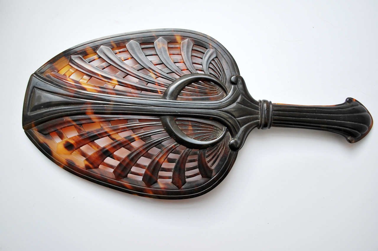 motivi decorativi vegetali stilizzati (portaspecchio, elemento d'insieme) di Giovanni Patrone (scuola) (prima metà sec. XX)