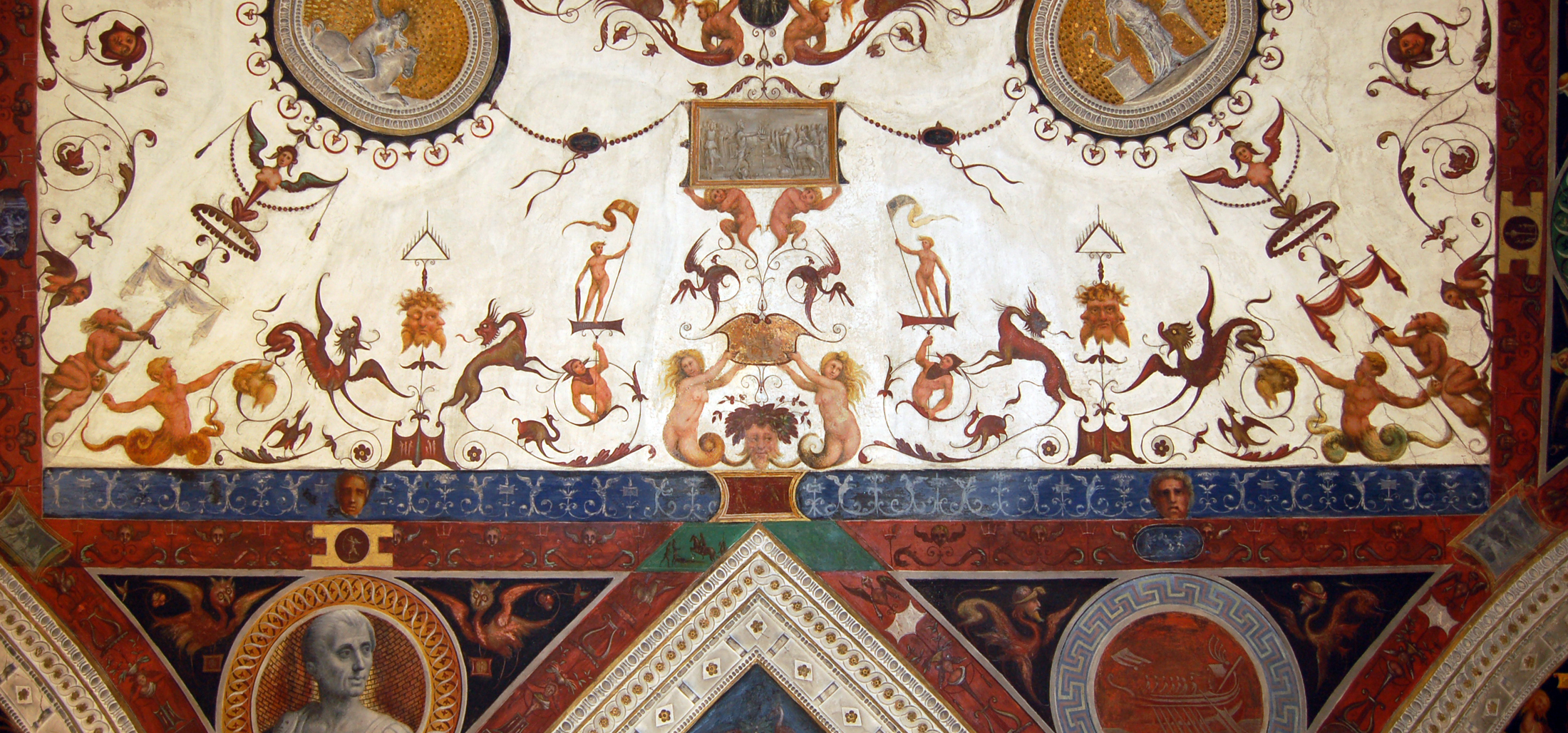 grottesche, soggetti profani (fascia ornamentale) di Leonbruno Lorenzo (e aiuti) (sec. XVI)