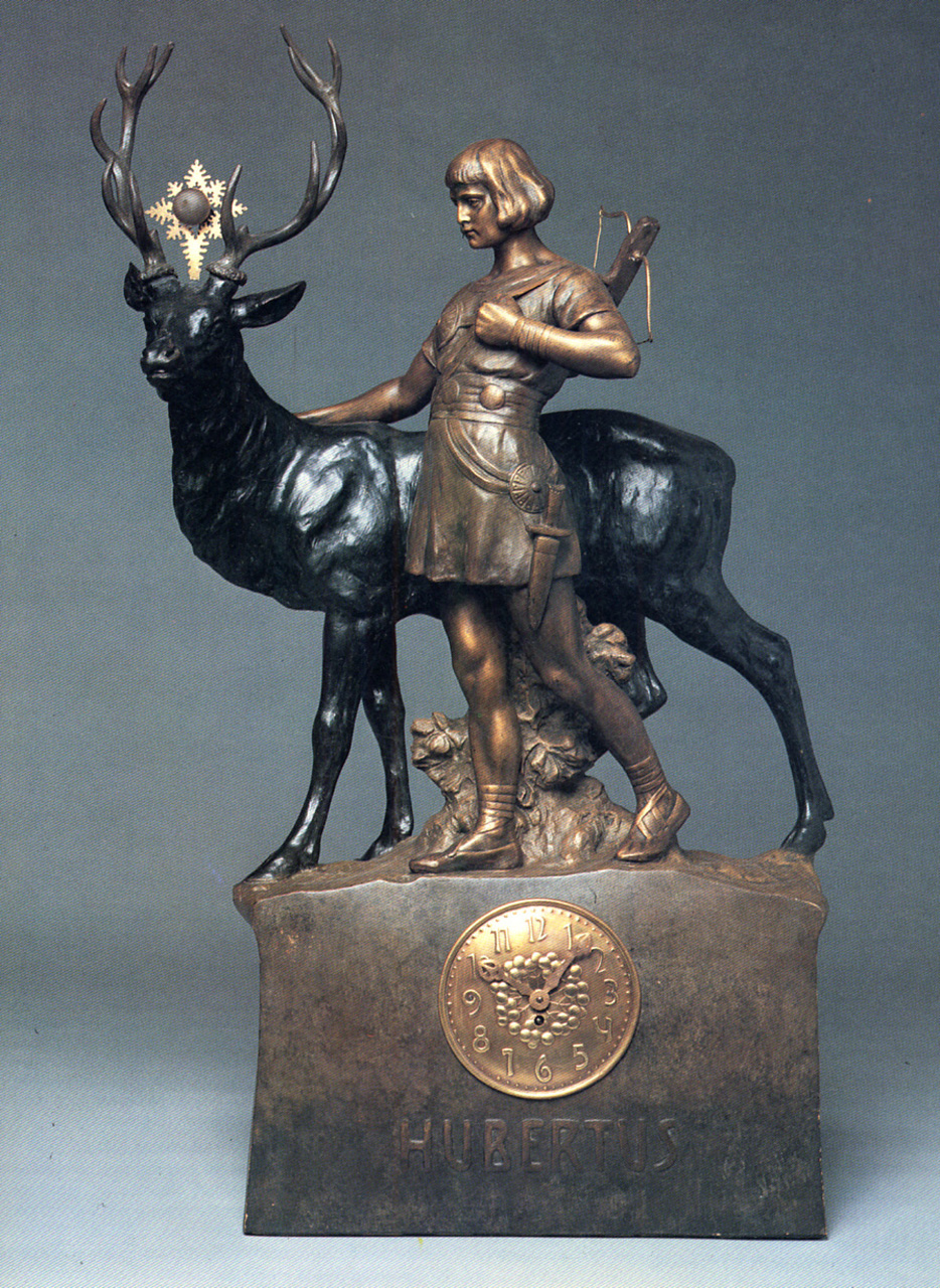 sant'Uberto accanto al cervo (orologio - da mensola, opera isolata) di Czapek Stanislaus Emil, A.G.U (inizio, inizio sec. XX, sec. XX)