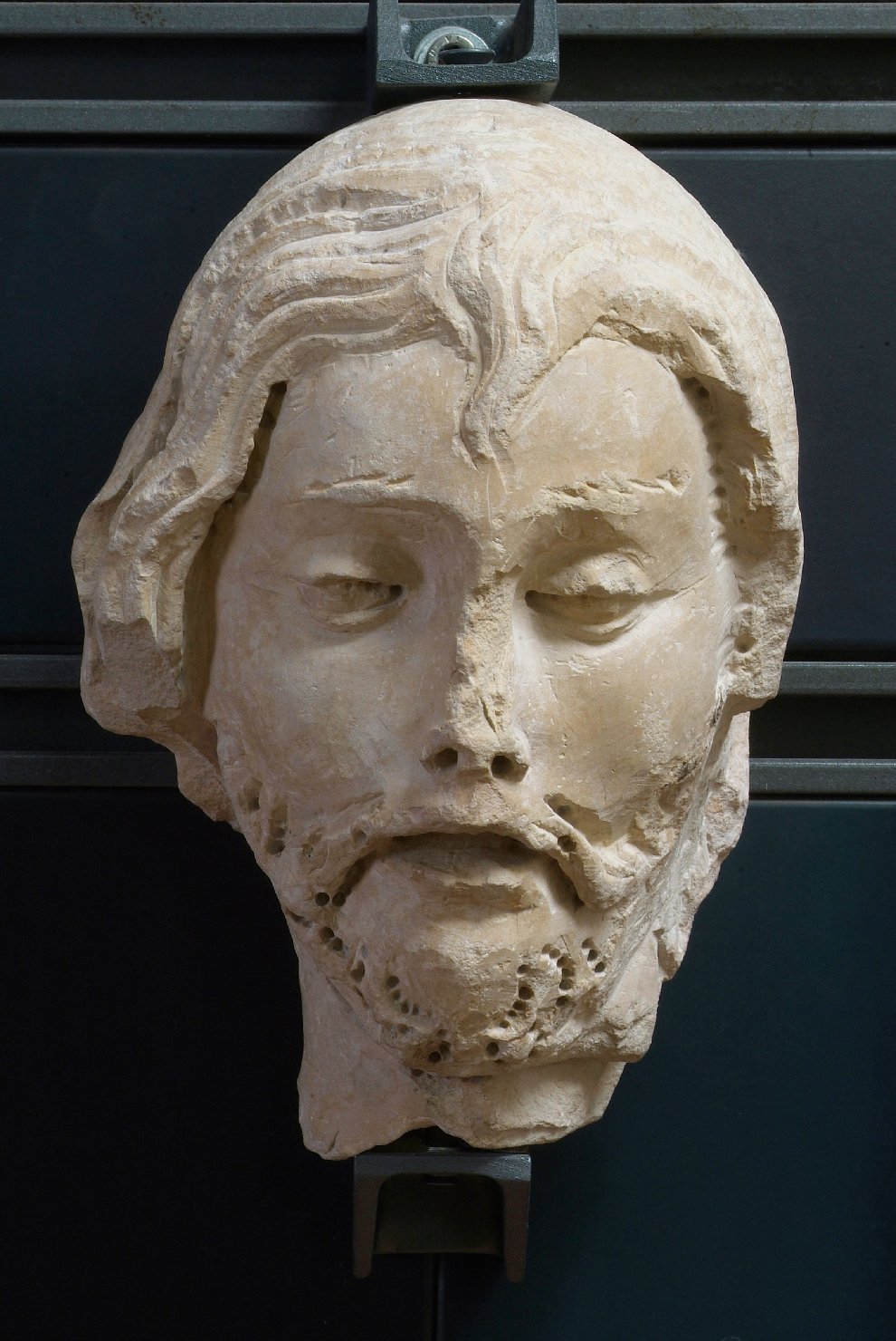 testa d'uomo (scultura, elemento d'insieme) di Agostino di Duccio (attribuito) (seconda metà sec. XV)
