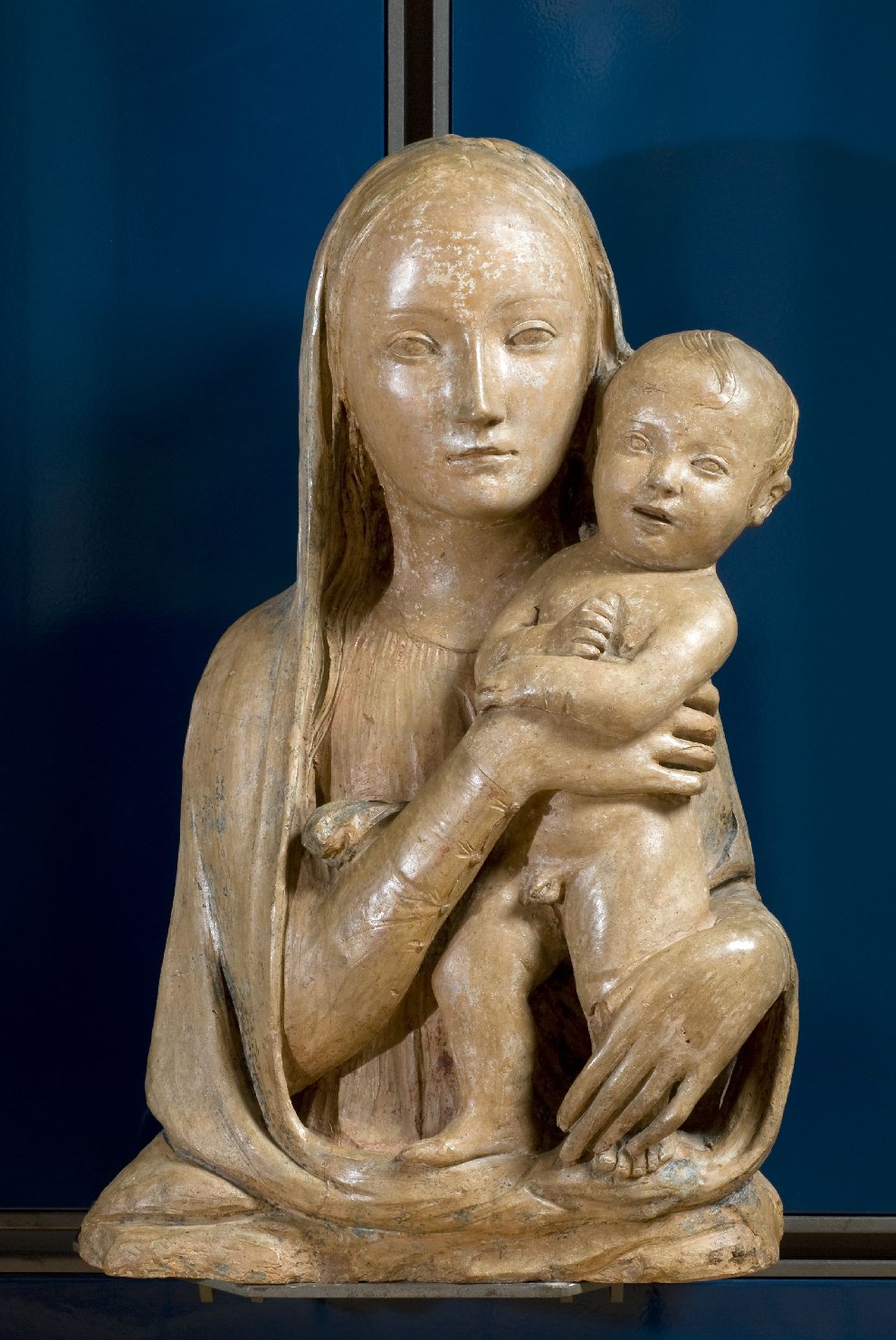 Madonna con Bambino (scultura, opera isolata) di Agostino di Duccio (attribuito) (metà sec. XV)