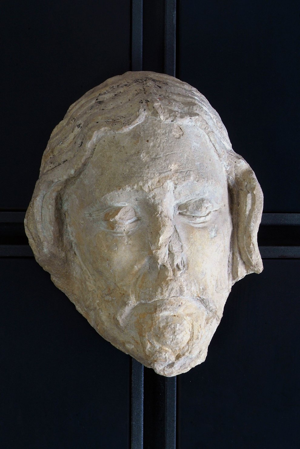 testa d'uomo (scultura, elemento d'insieme) di Agostino di Duccio (attribuito) (seconda metà sec. XV)