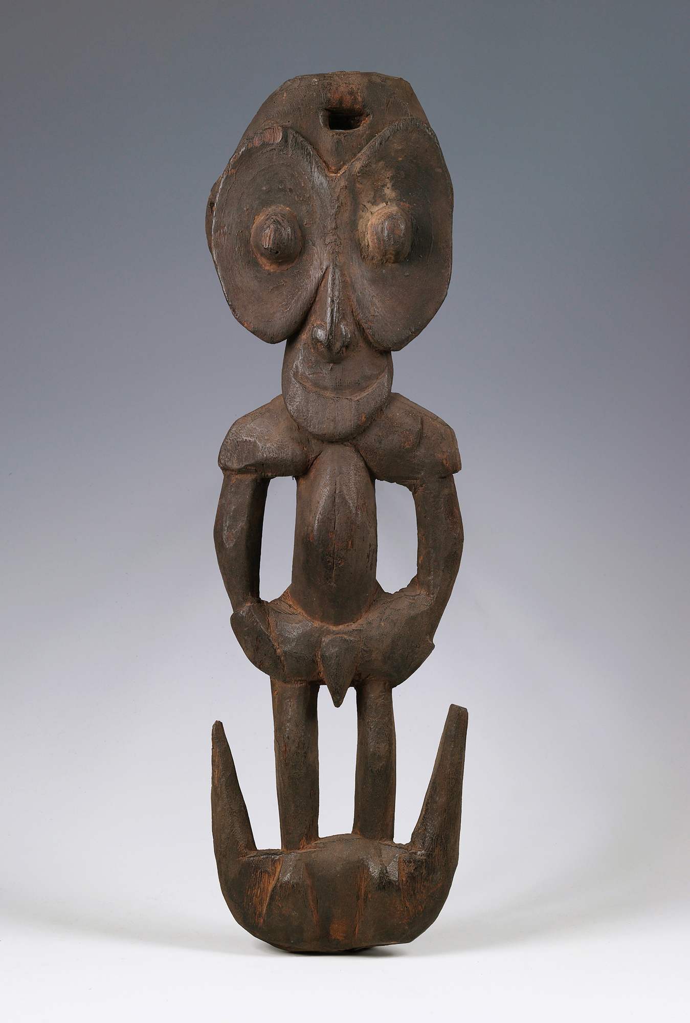Hook cranium, figura antropomorfa (gancio di sospensione) - ambito della Nuova Guinea (inizio XX)