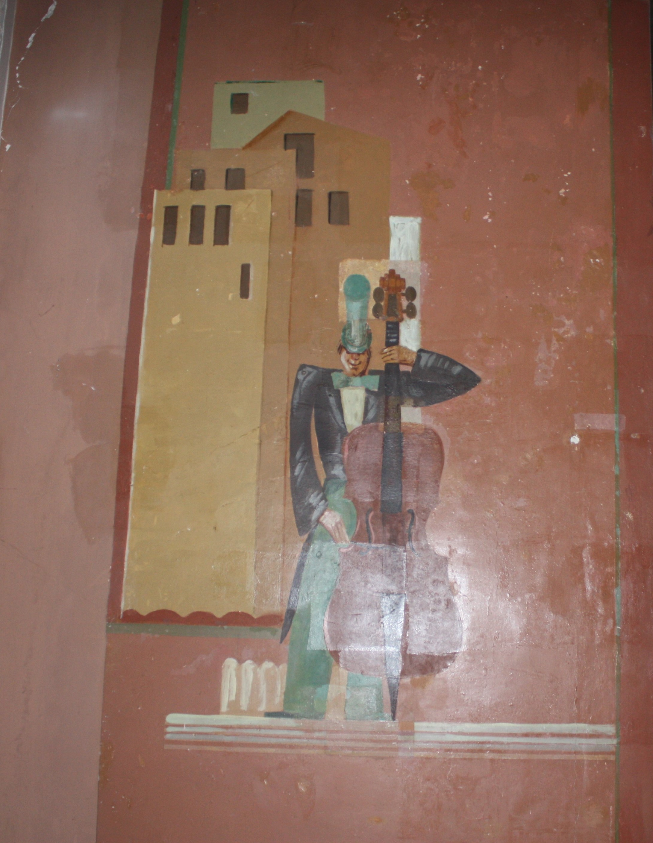 Violoncellista, figura maschile con strumento musicale (dipinto, complesso decorativo) di La Rovere Virginio (attribuito) (XX)