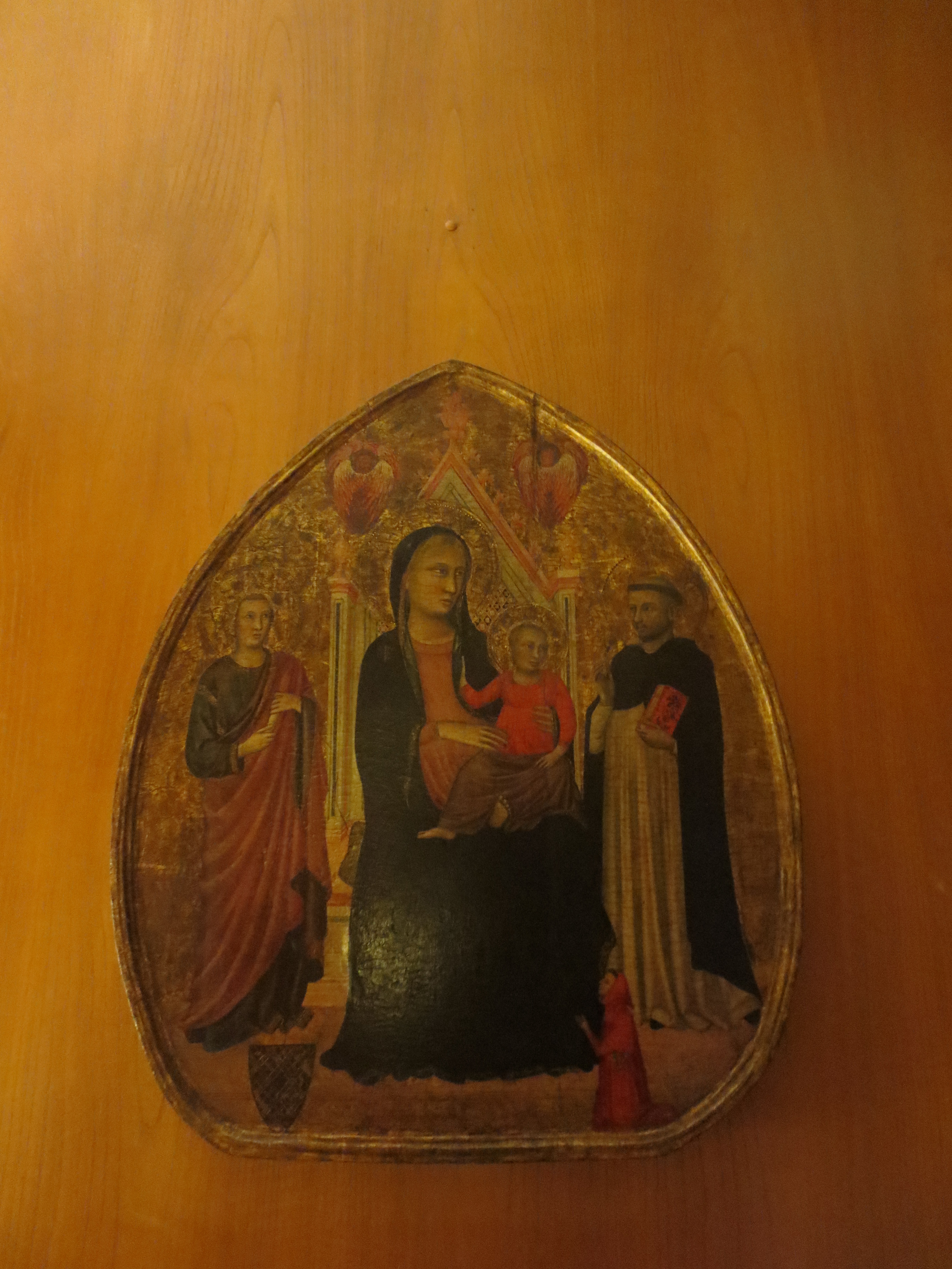 Madonna col Bambino, San Giovanni Evangelista, San Domenico e offerente (dipinto, opera isolata) di Pacino di Bonaguida (attribuito) (sec. XIV)