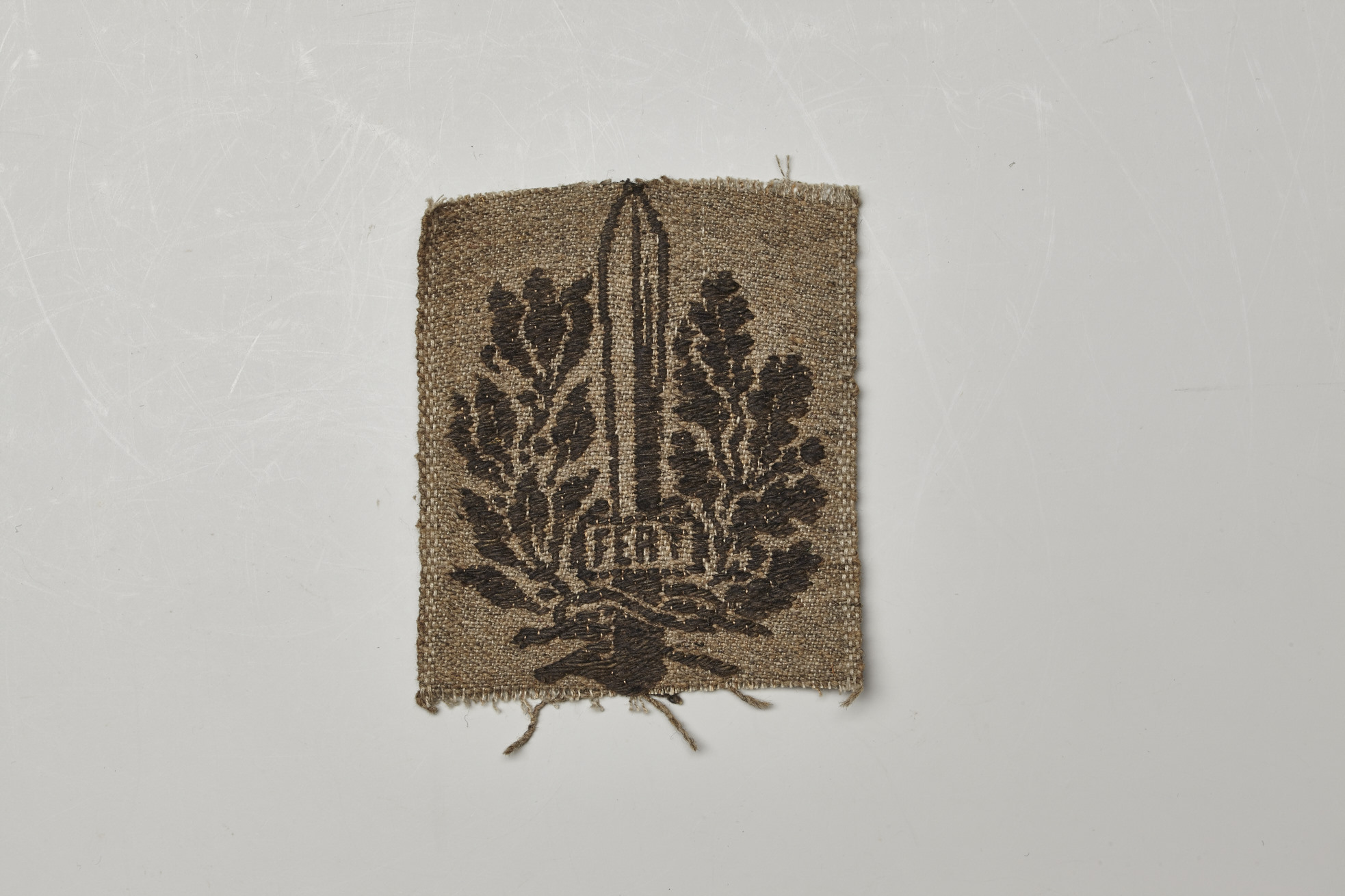 fregio, da berretto (XX secolo)