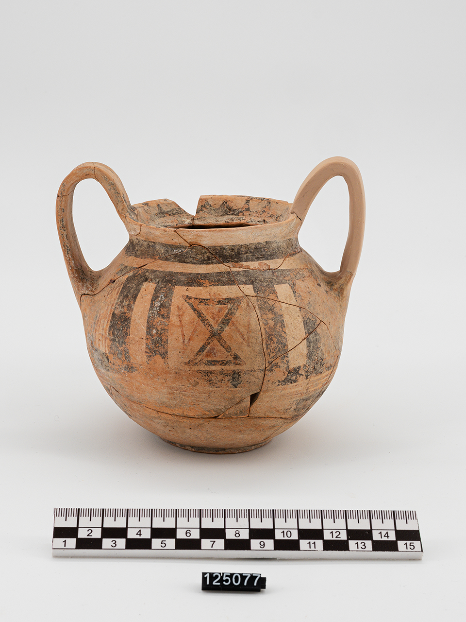 Motivi geometrici, figura antropomorfa (olla) (fine VIII a.C)