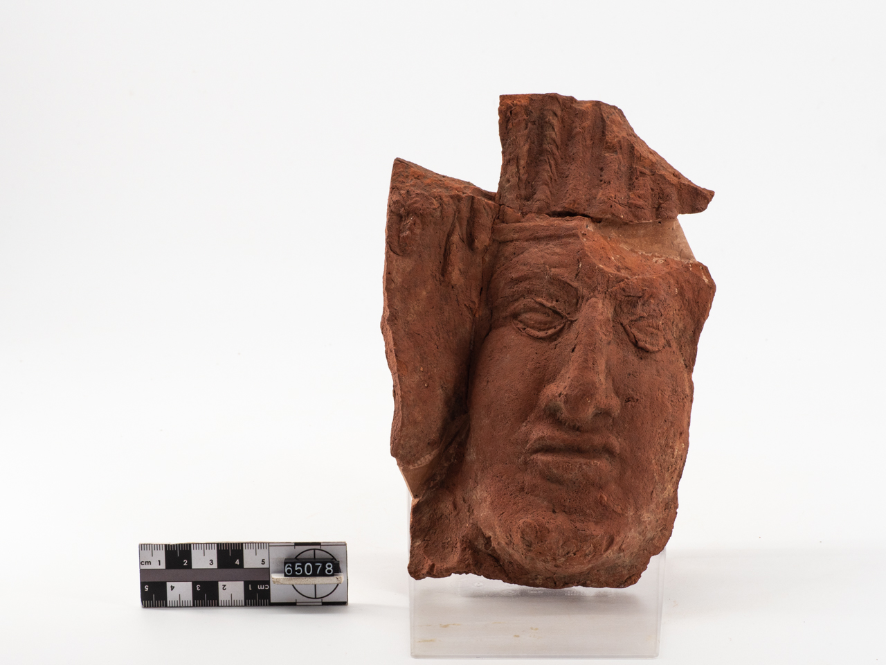 terracotta architettonica/ con viso umano, frammento (I a.C. - I d.C)