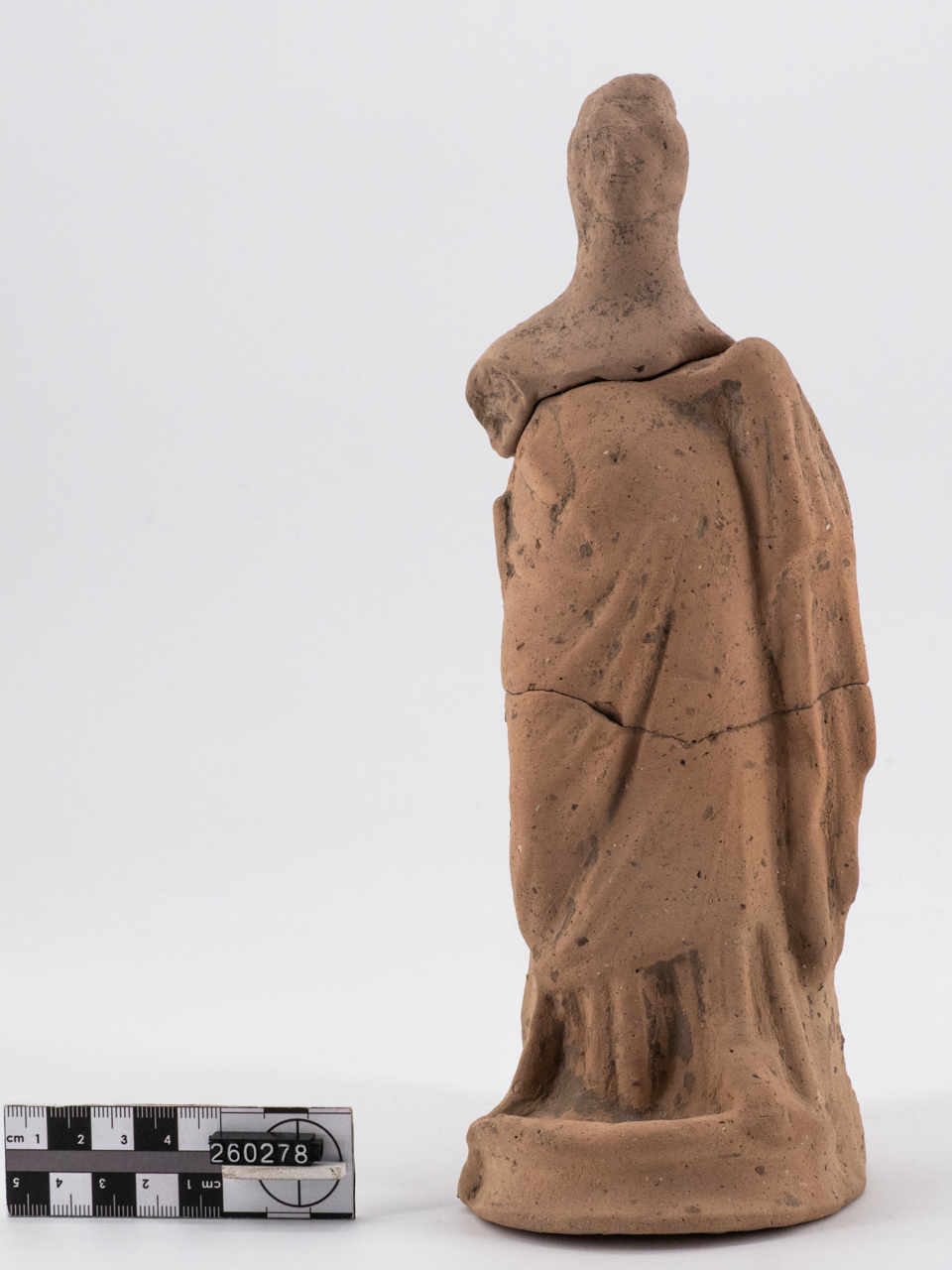 statuetta/ femminile, stante, panneggiata - lucana (IV a.C.-III a.C)