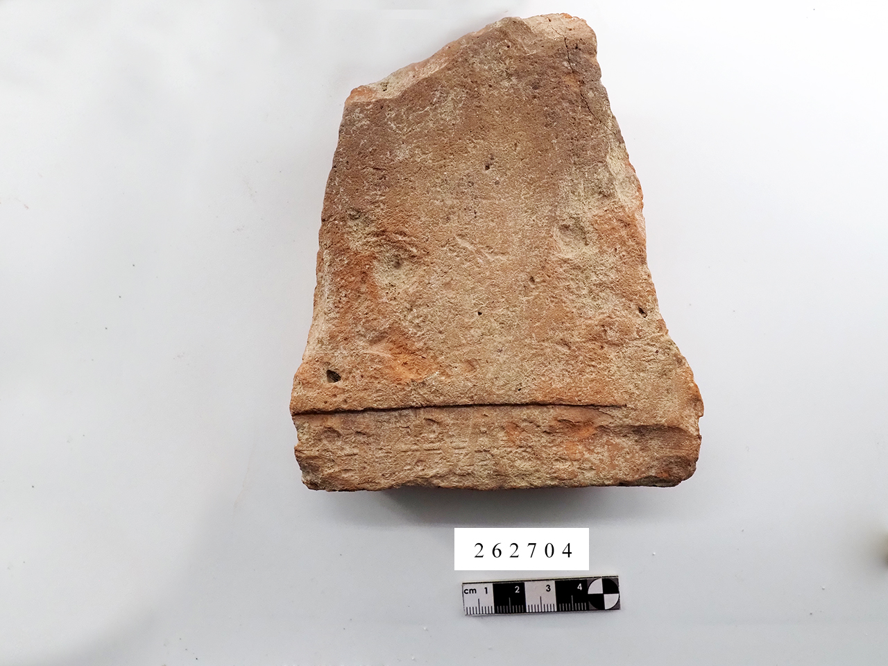 mattone/ con bollo, frammento - locale (I a.C.-II)