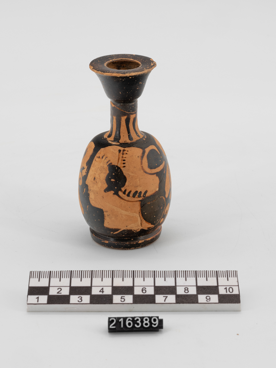 volto femminile (lekithos) (SECOLI/ IV a.C)