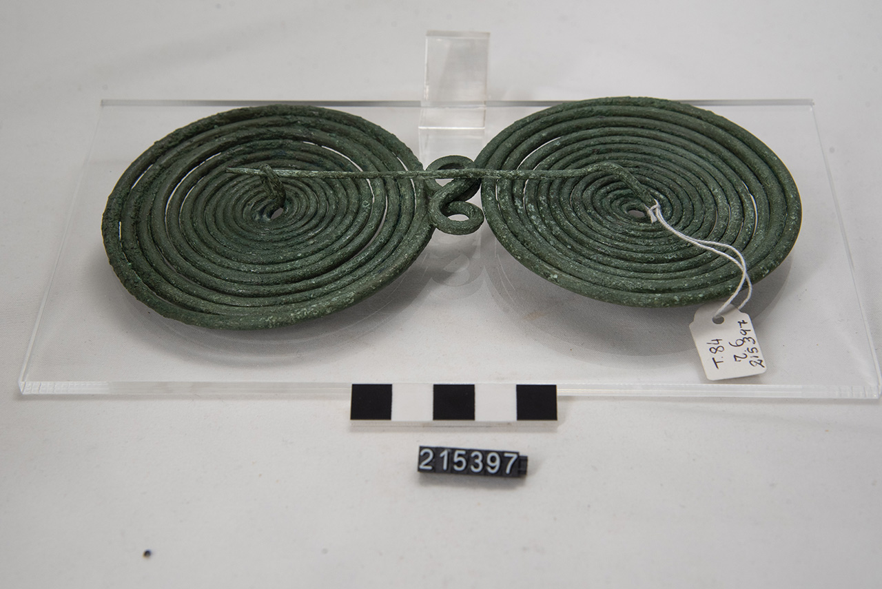 fibula/ ad occhiali (SECOLI/ IX a.C)