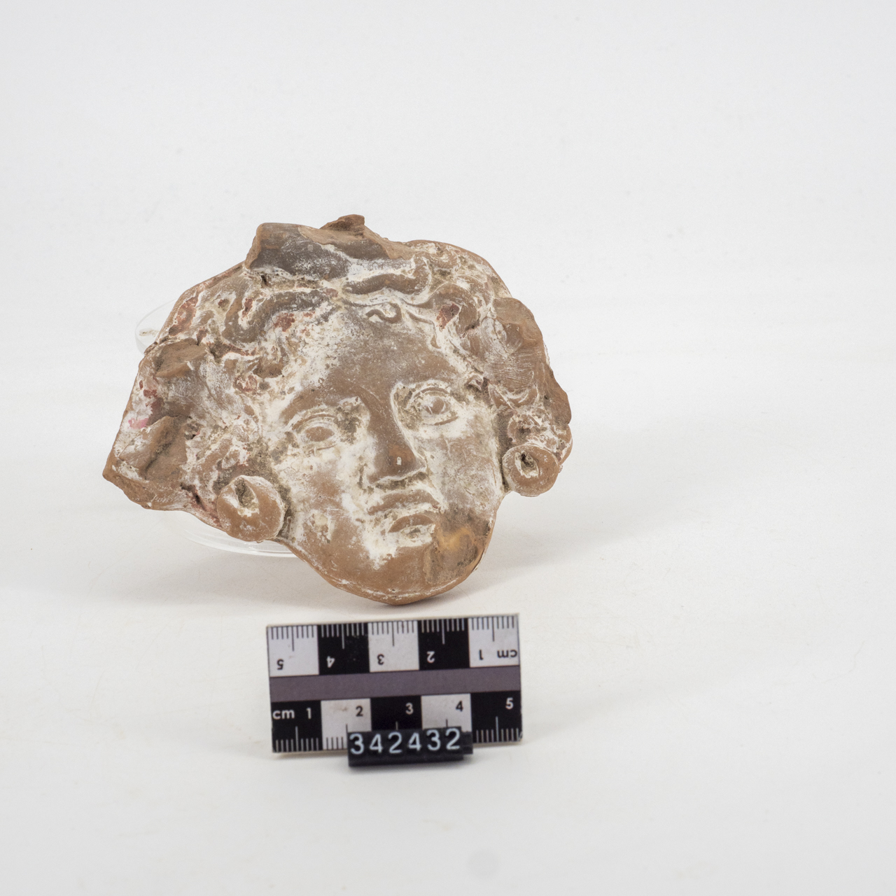 applique, a protome maschile (ca SECOLI/ ARCHI DI SECOLI/ IV a.C.-III a.C)