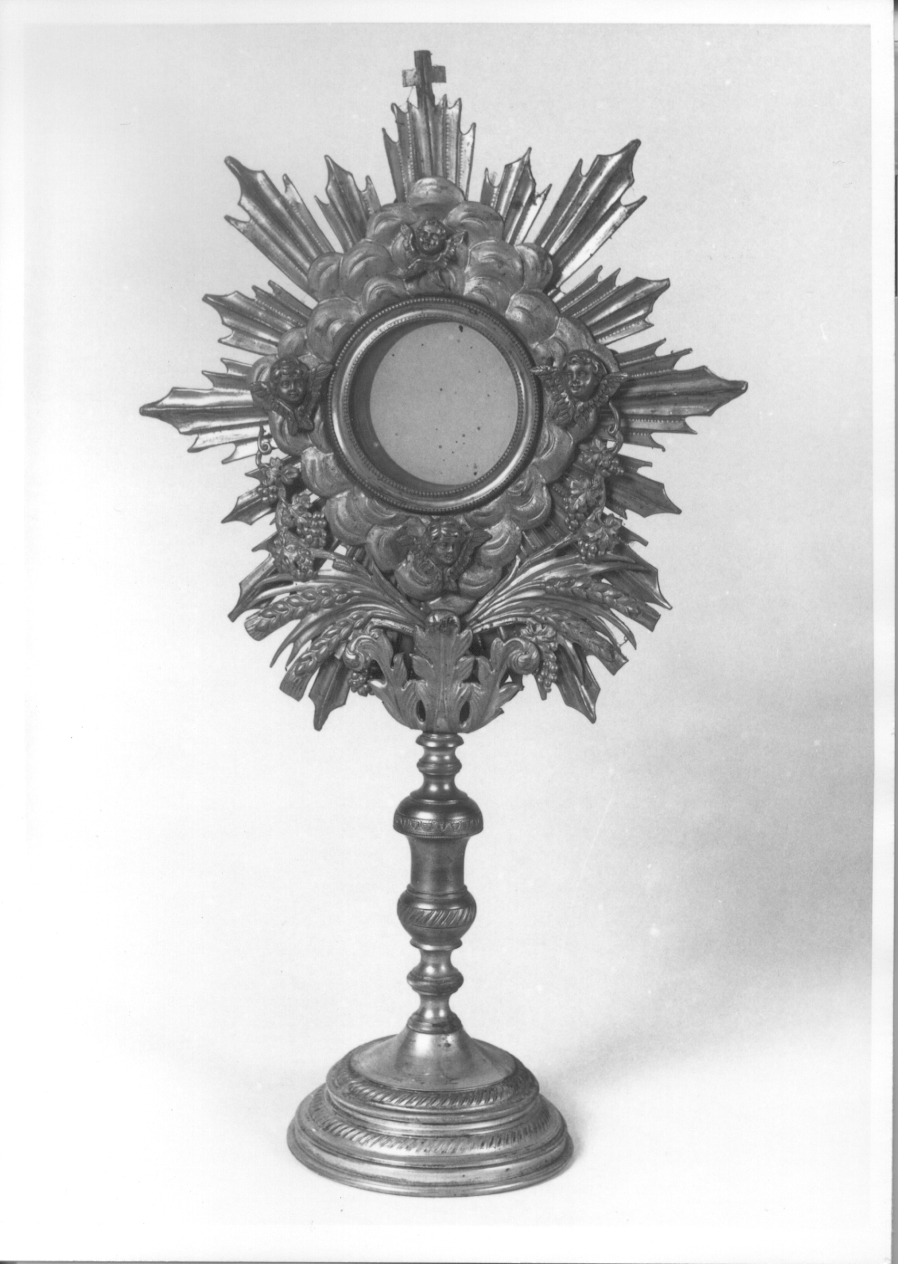 cherubini e motivi decorativi fitomorfi (ostensorio - a raggiera, opera isolata) - produzione italiana (primo quarto sec. XX)
