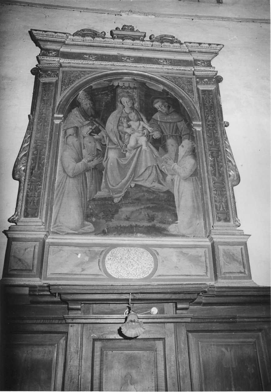 Madonna con Bambino in trono tra santi e donatori (dipinto, opera isolata) di Lanino Bernardino (attribuito) (sec. XVI)