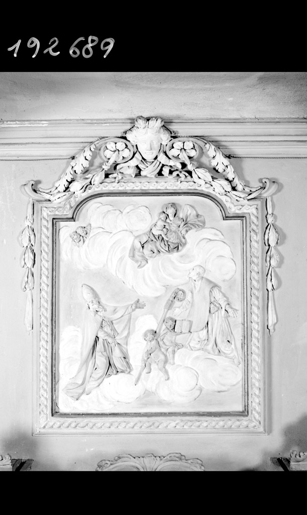 Madonna con Bambino e due Santi Vescovi (rilievo) di Bianconi Carlo (sec. XVIII)