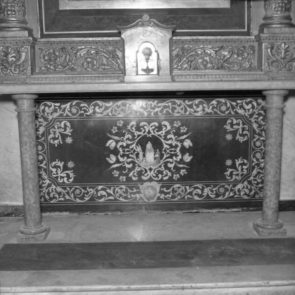 Madonna col Bambino in trono tra l'angelo custode e Sant'Antonio da Padova entro cornice decorativa a motivi fitomorfi (paliotto) - manifattura emiliana (seconda metà sec. XVII)