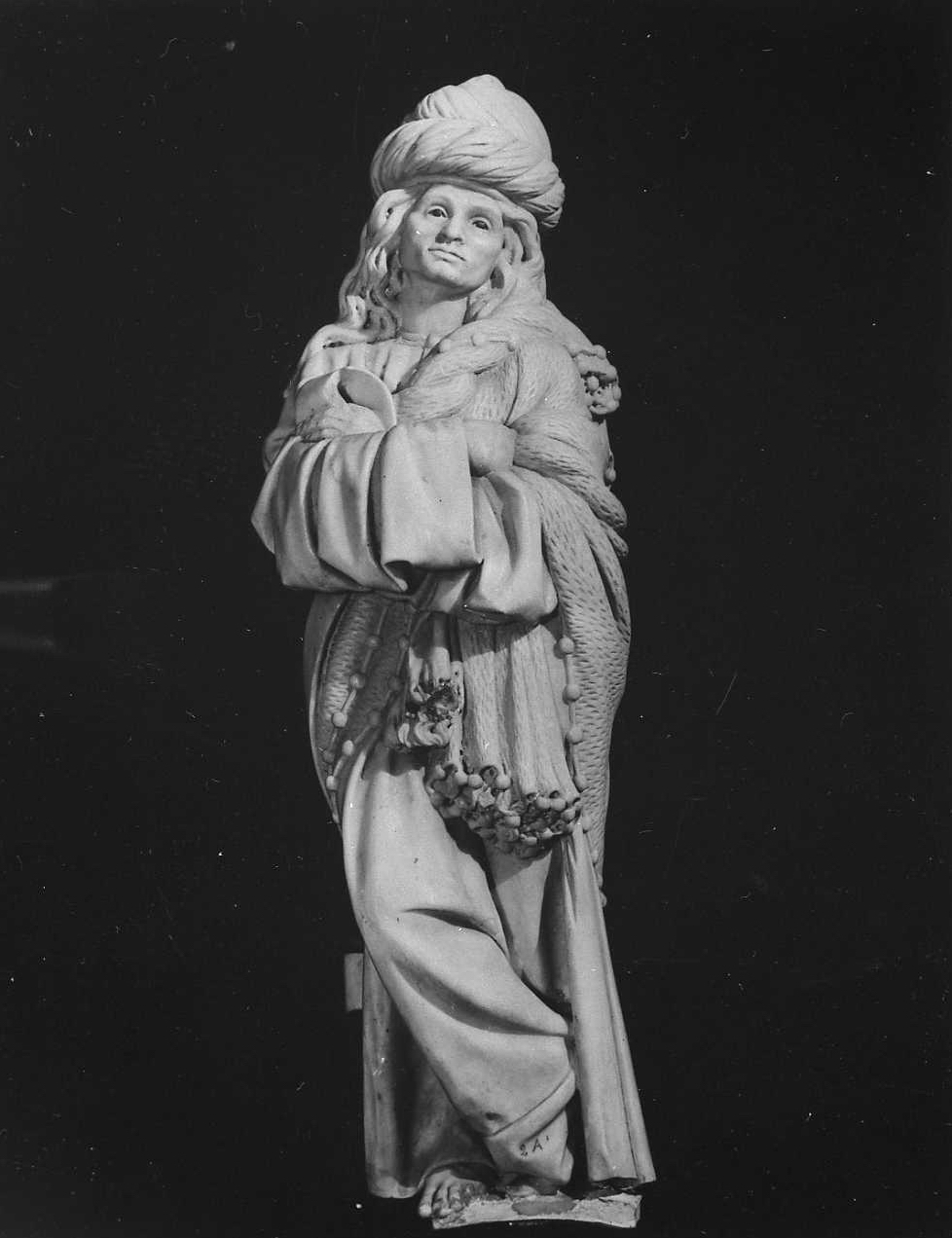 San Giovanni evangelista (scultura, elemento d'insieme) di Niccolò de Apulia detto Niccolò dell'Arca (sec. XV)