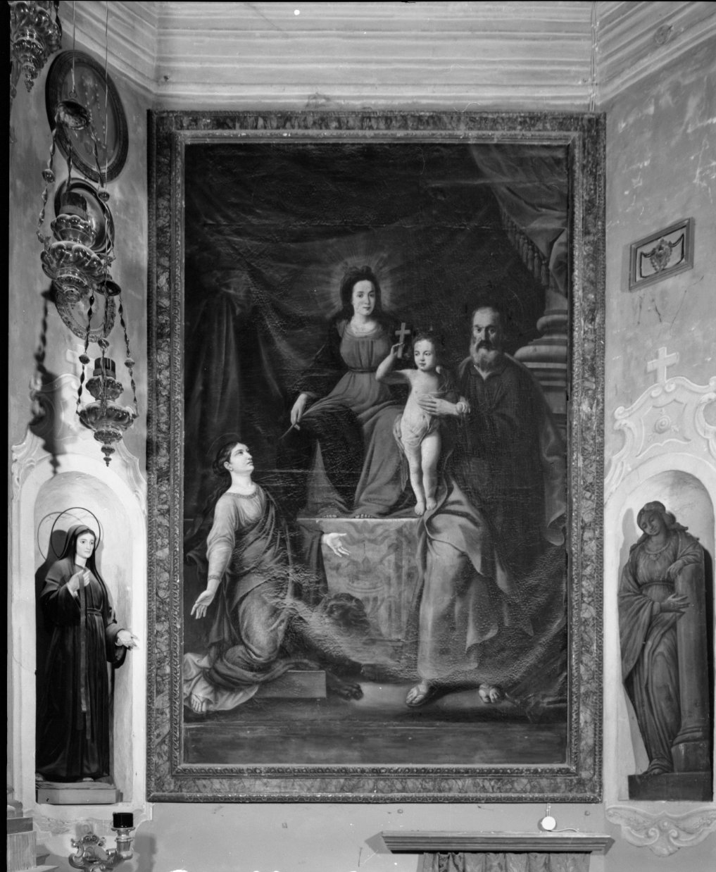 Madonna in trono con il Bambino tra San Giuseppe e Santa Tecla (dipinto) di Vangebens Giovanni (sec. XVII)