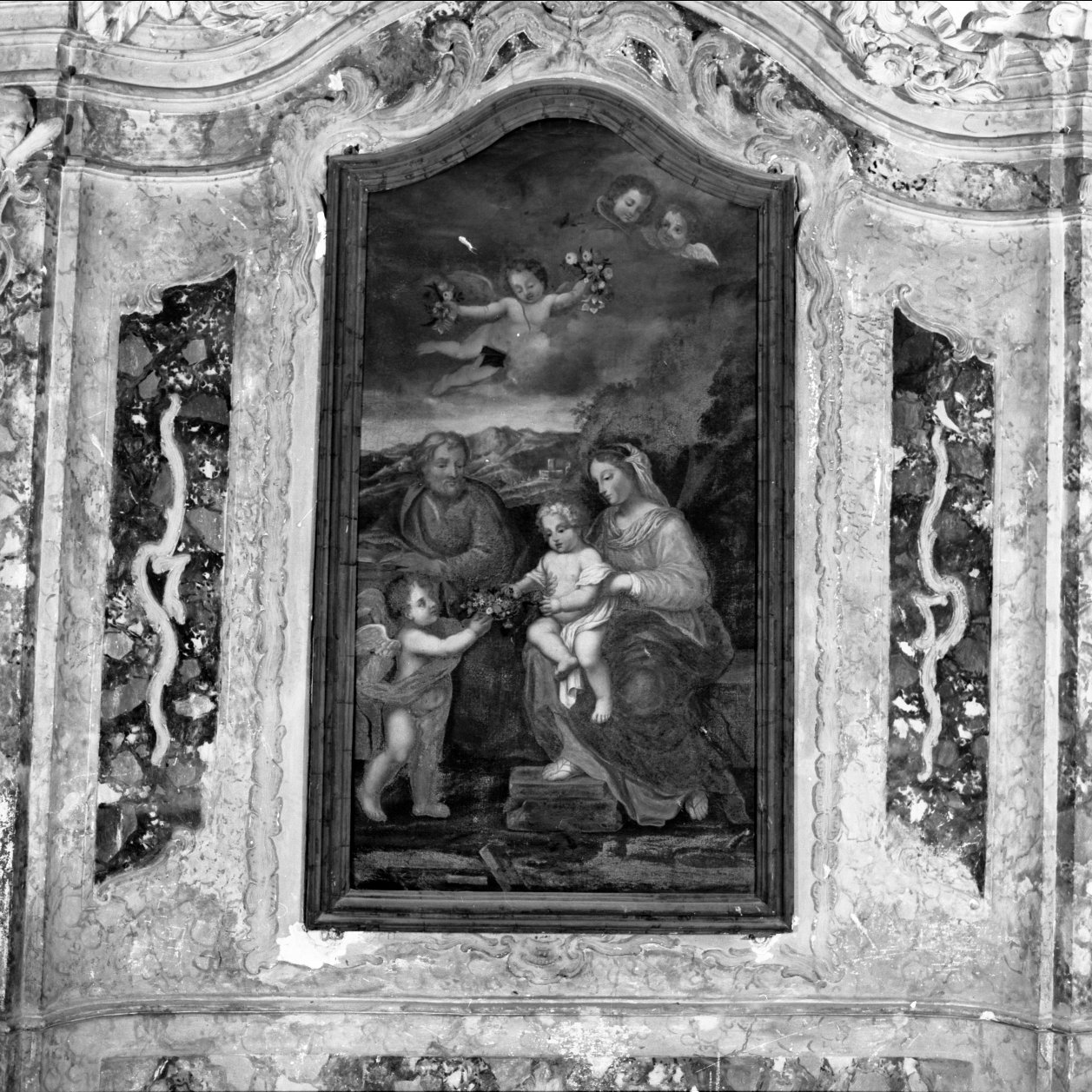 Sacra Famiglia con San Giovanni Battista bambino (dipinto, elemento d'insieme) di Menegatti Giuseppe (sec. XVII)