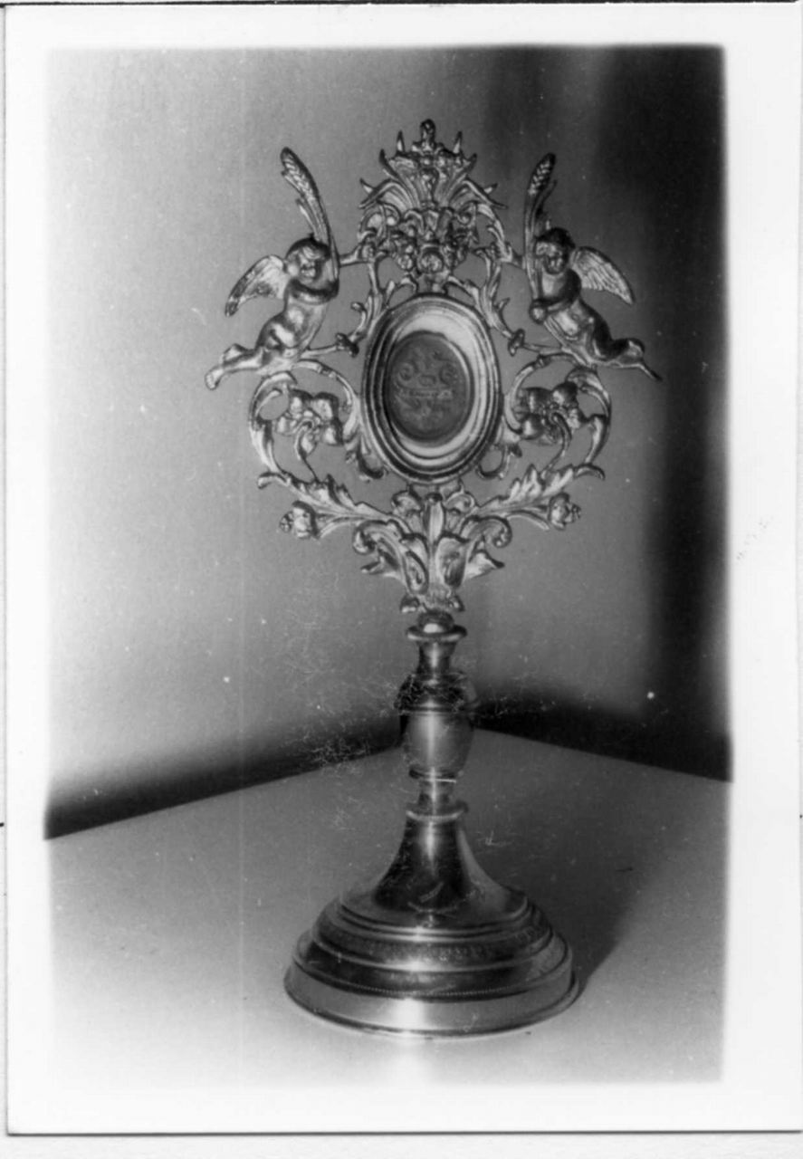 cherubini e motivi decorativi a volute (reliquiario) - bottega italiana (fine sec. XIX)