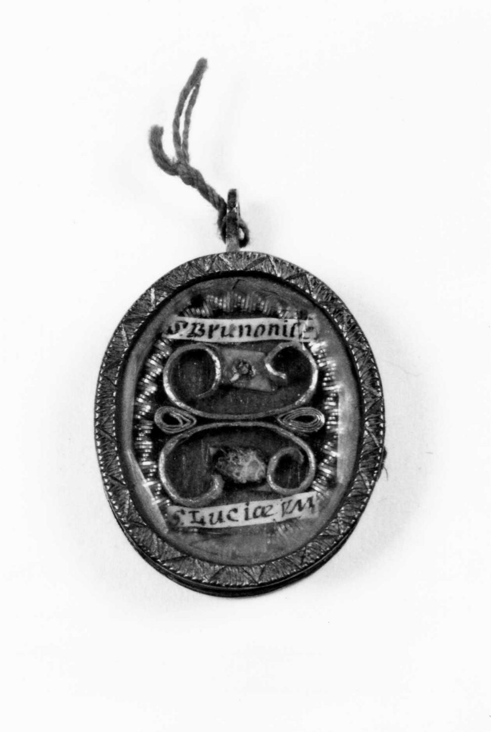 reliquiario a capsula - a medaglione - bottega emiliana (fine/inizio secc. XVIII/ XIX)