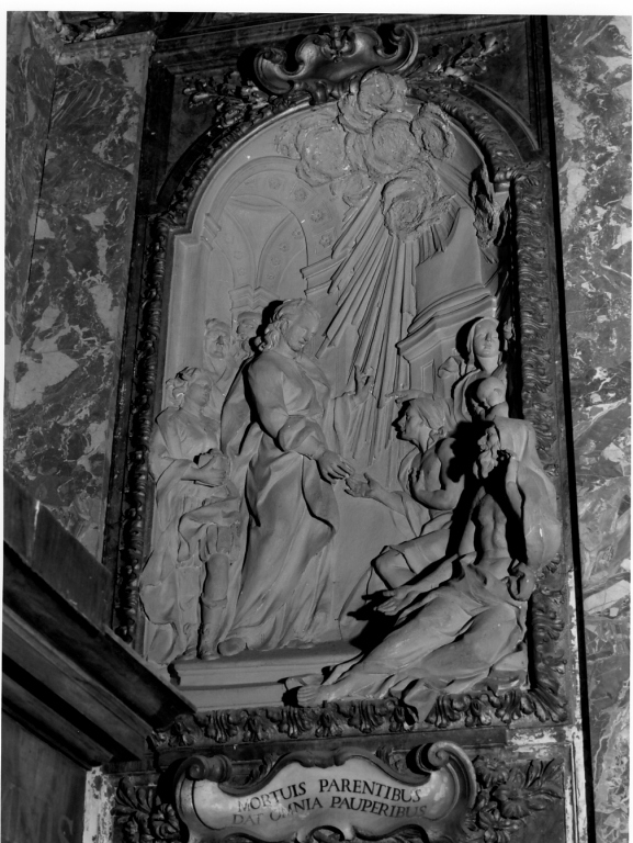 San Nicola distribuisce i suoi beni ai poveri (rilievo) - ambito romano (sec. XVIII)