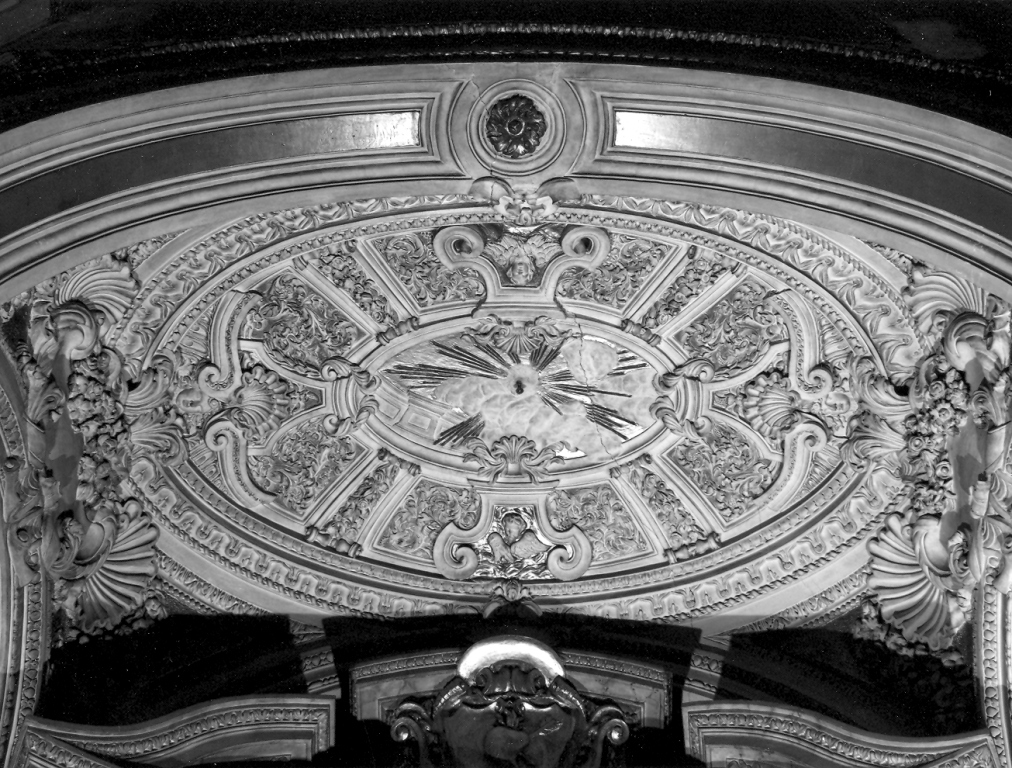 cornice con motivi decorativi a conchiglia, racemi e testine (decorazione plastica) di Cometti Antonio, Cometti Carlo (sec. XVII)