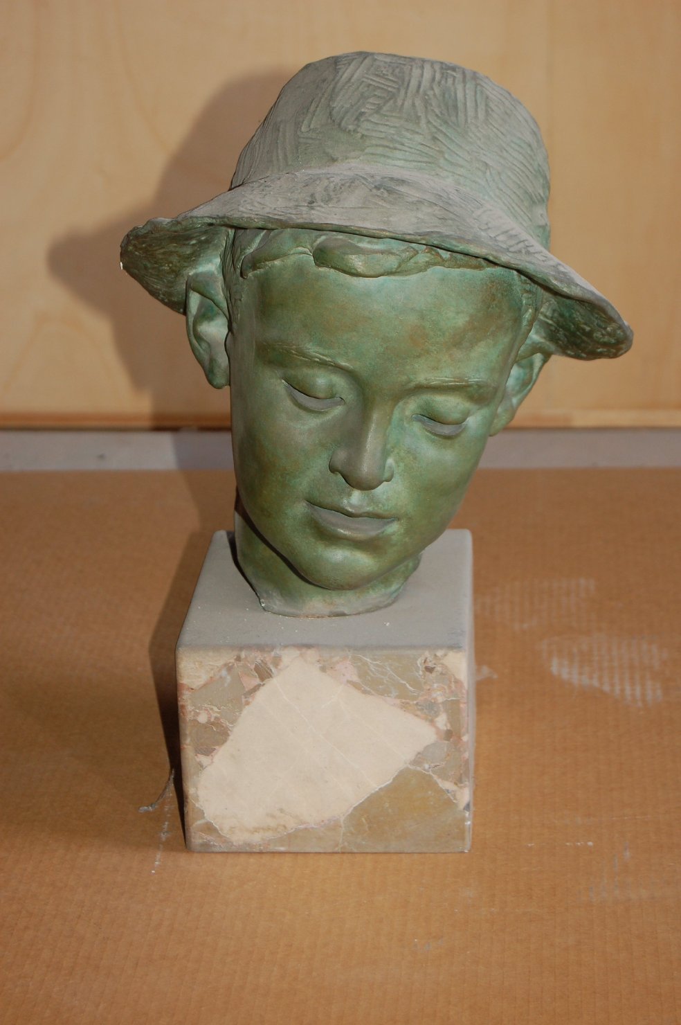 Testa di ragazzo con cappello (scultura, opera isolata) di Venturini Romolo (attribuito) (sec. XX)