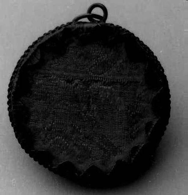 reliquiario a capsula - a medaglione - bottega sarda (fine/inizio secc. XIX/ XX)