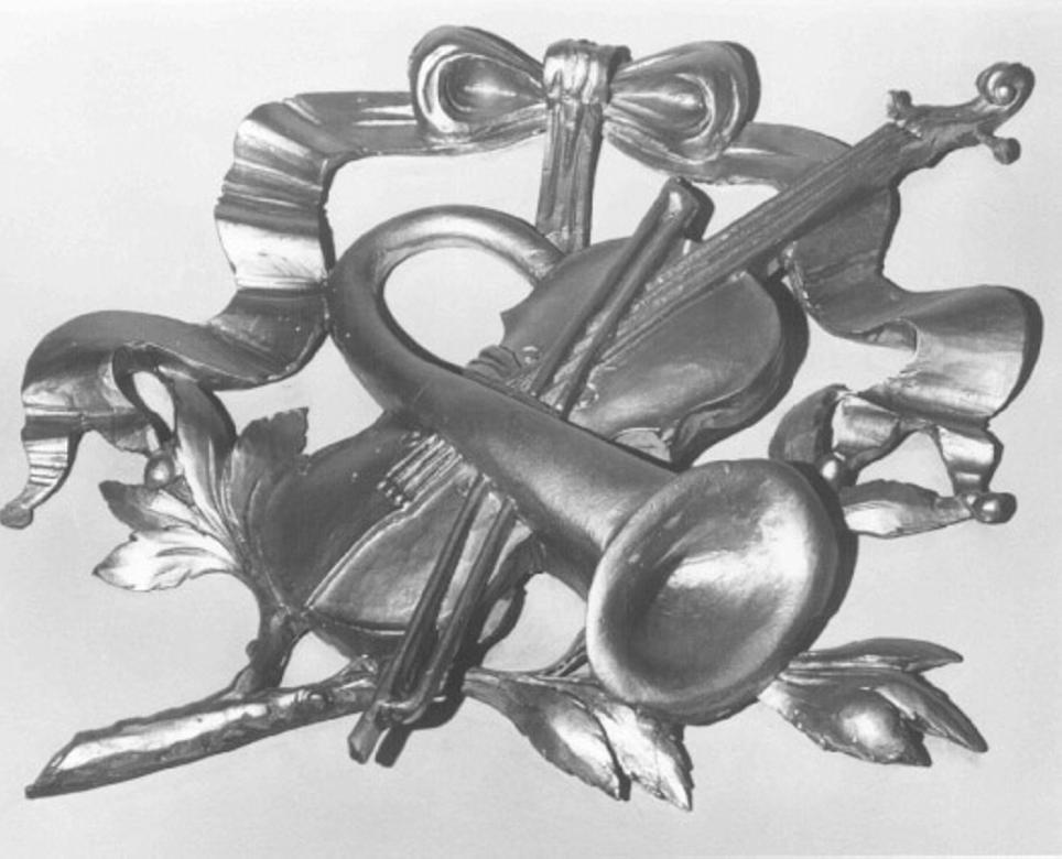 strumenti musicali (decorazione plastica, elemento d'insieme) di Morseletto Carlo (sec. XX)